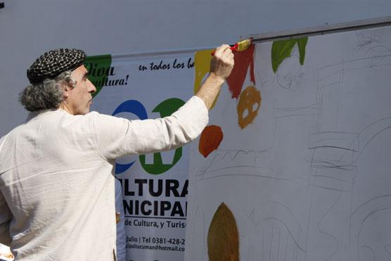 Ayer el condimento especial fue la presencia del dibujante Miguel Rep, que pintó un mural frente al público