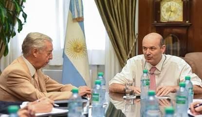 El presidente de CAME Osvaldo Cornide con el titular del BCRA, Federico Sturzenegger