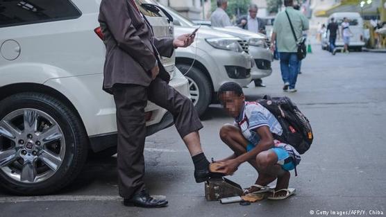 Un lustrin en las calles de Rio