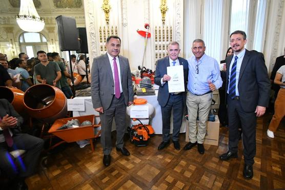 Jaldo, Amado y Racedo durante la entrega