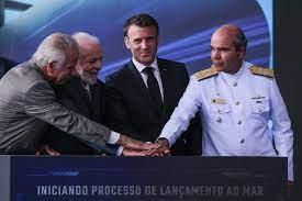 El ministro Monteiro, Lula, Macron y Marcos Sampaio Olsen 